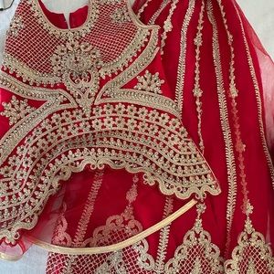 Red and gold Lehenga